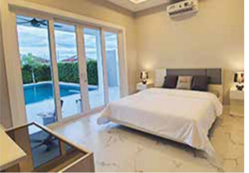 Bedroom with pool outlook